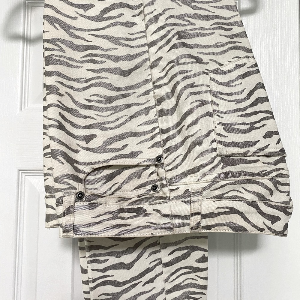 Silver metallic  and white zebra style jeans from Chicos.